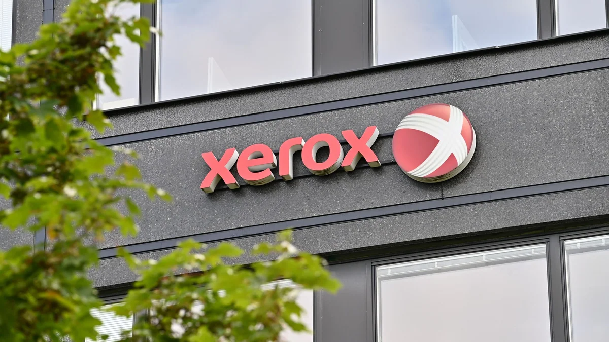 Xerox ve Lexmark birleşmesini simgeleyen yazıcı ve belge görseli