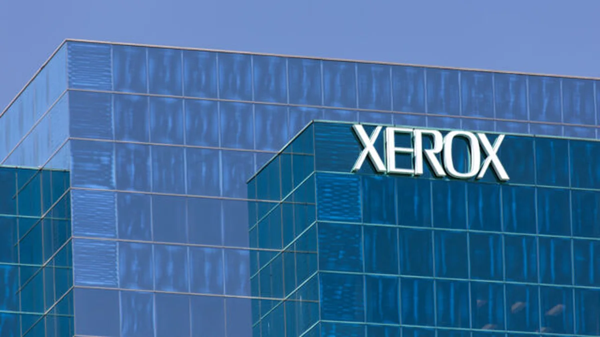 Xerox ve Lexmark birleşmesini temsil eden kurumsal bina ve logo görseli